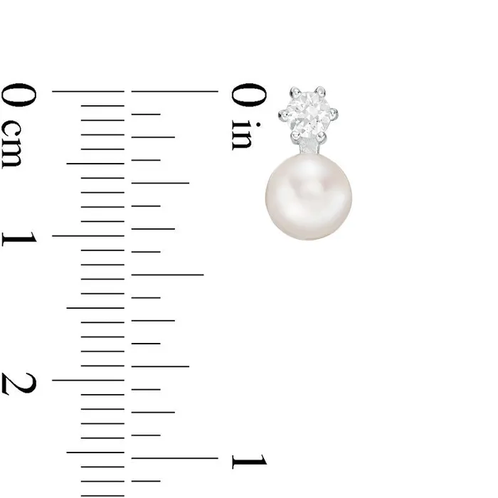 Goldia 6570mm Button Cultured Freshwater Pearl and LabCreated White Sapphire Stud Earrings in Sterling Silver Earrings Goldia 6570mm Button Cultured Freshwater Pearl and LabCreated White Sapphire Stud Earrings in Sterling Silver Earrings