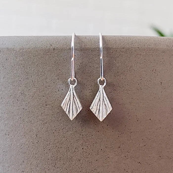 Corey Egan Flame Silver Dangle Earrings Earrings